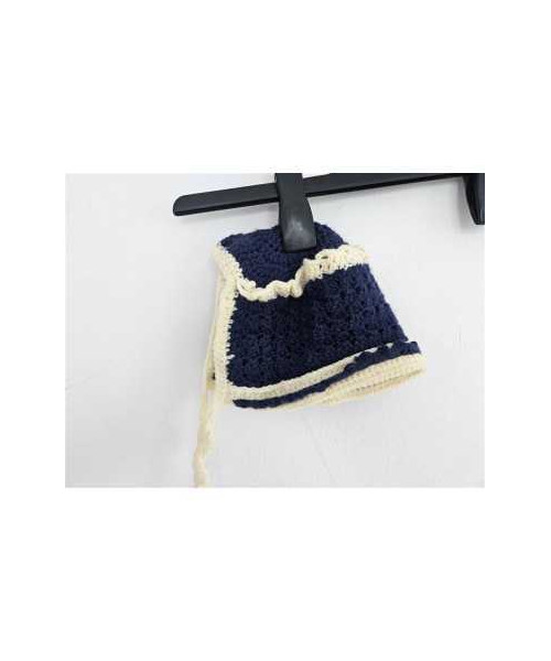 Caciulita tricotata pentru copii model cu gaurele