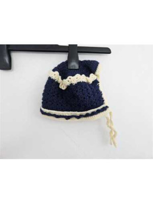 Caciulita tricotata pentru copii model cu gaurele 2