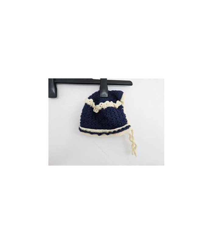 Caciulita tricotata pentru copii model cu gaurele