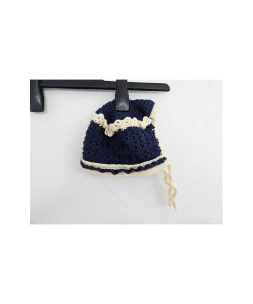 Caciulita tricotata pentru copii model cu gaurele