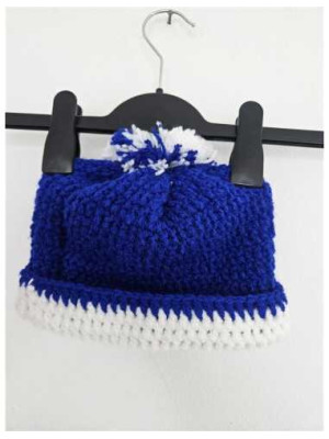 Caciula calduroasa cu ciucure model crosetat 2