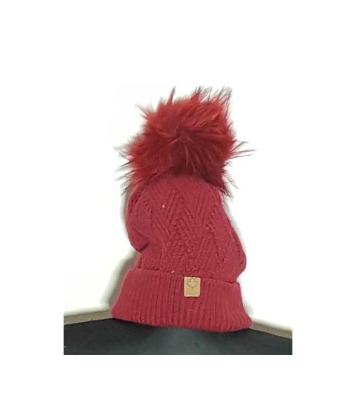 Caciula de iarna tricotata model cu ciucure pufos